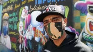 Artista pone mascarillas a grafitis para alertar del COVID-19 en ...