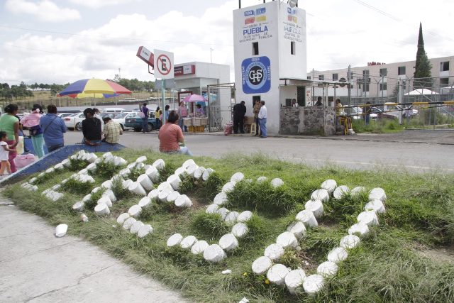 Confirman que cuerpo del bebé hallado en penal de Puebla ya está con sus padres